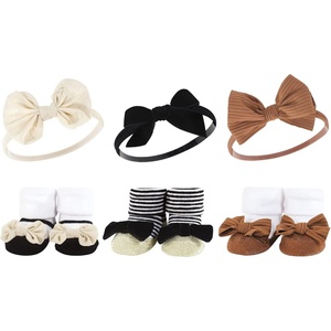 image:imageHudson Baby Unisex Baby Headband and Socks SetBlack Stripe Neutrals